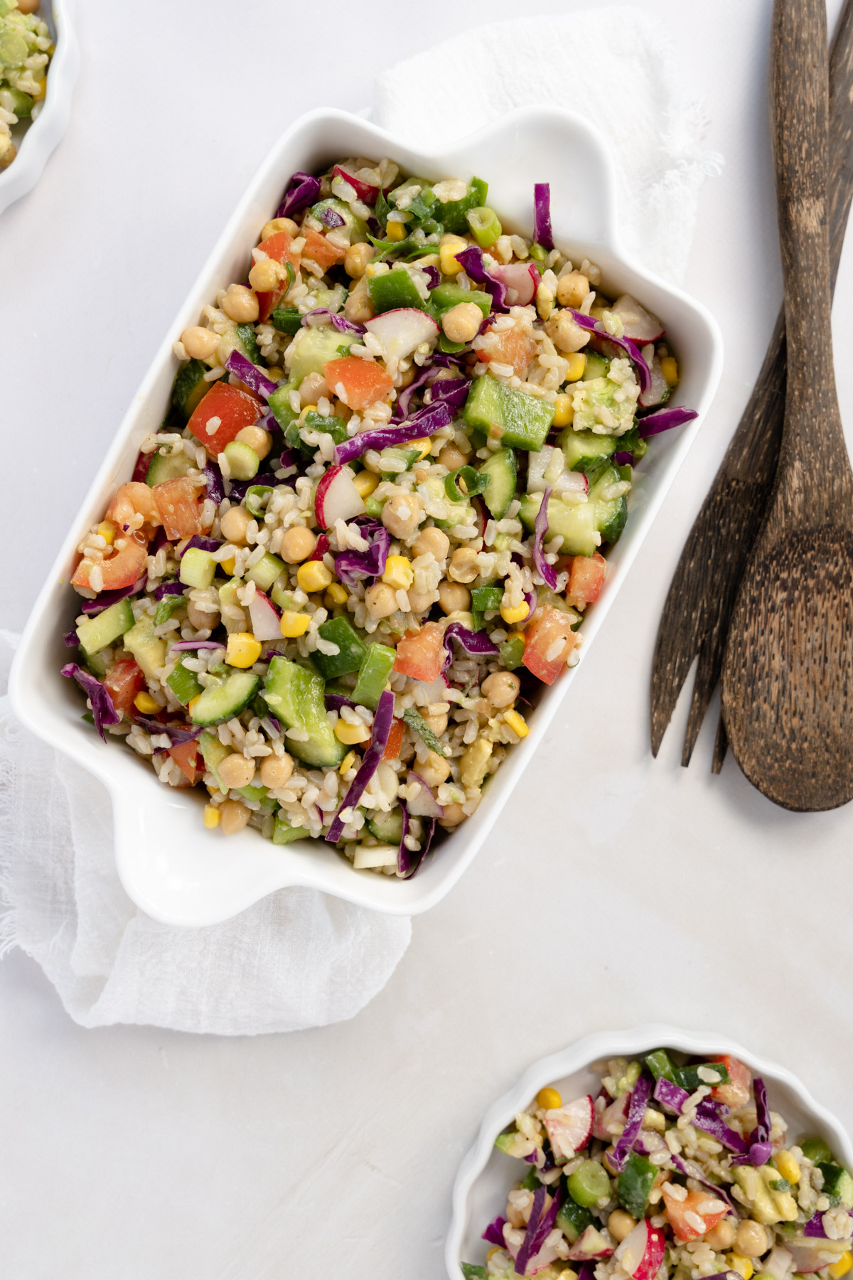 brown rice salad in a white dish