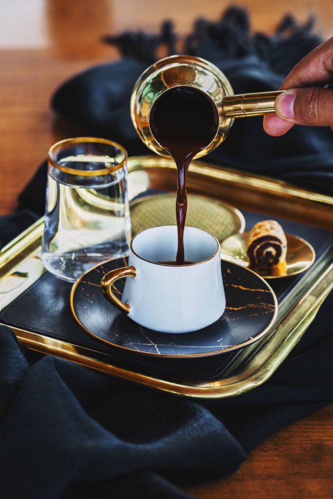 Raqwa - Lebanese Coffee Pot being used to serve strong black coffee