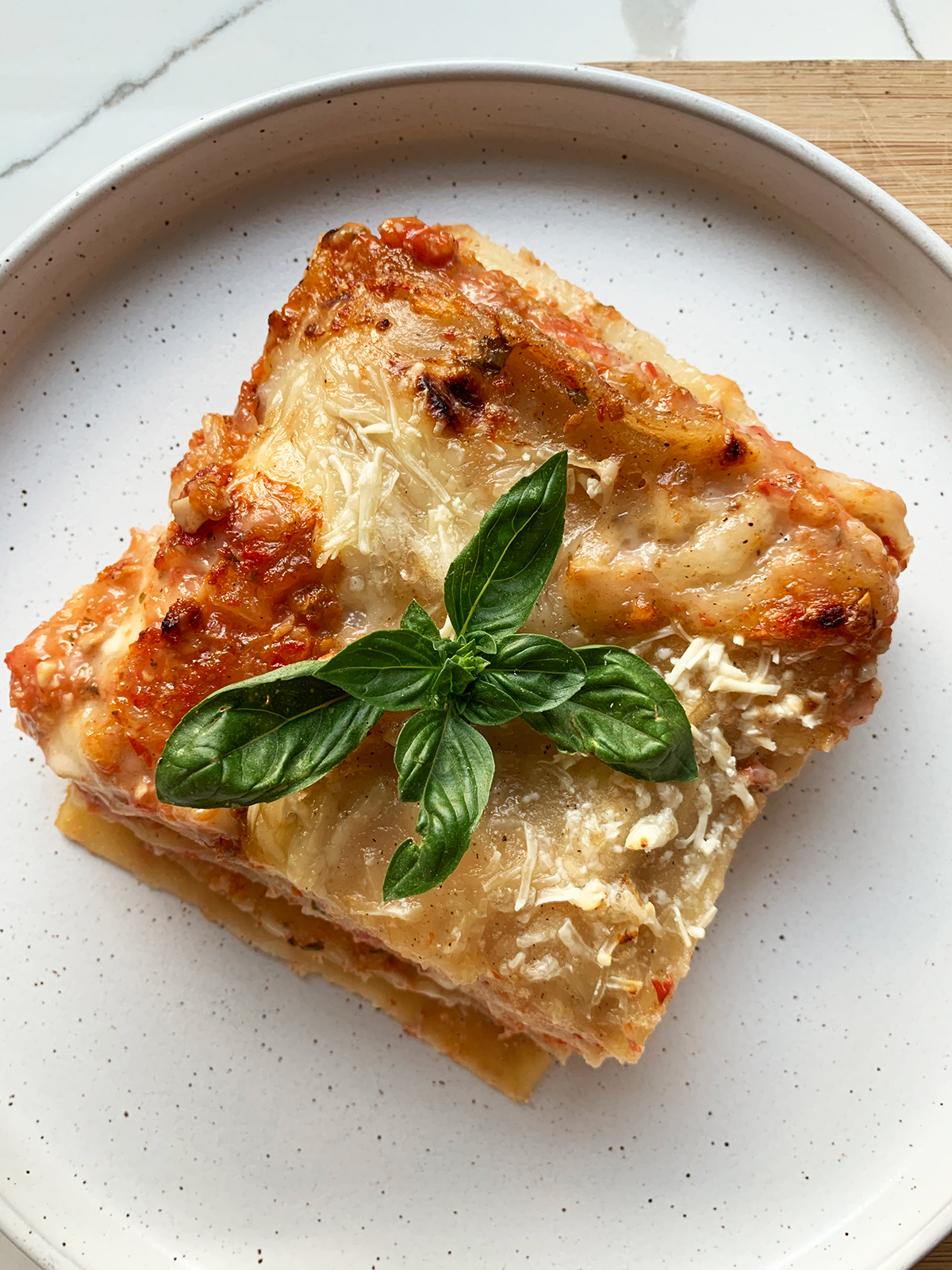 vegan lasagna garnished with basil