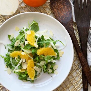 Orange and Fennel salad (vegan recipe) served on a white plate