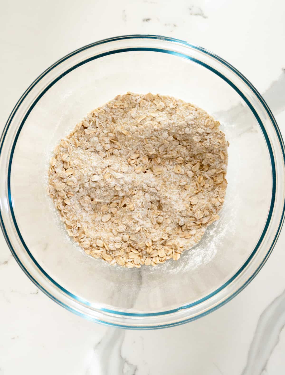 flour, rolled oats mixed in a glass bowl