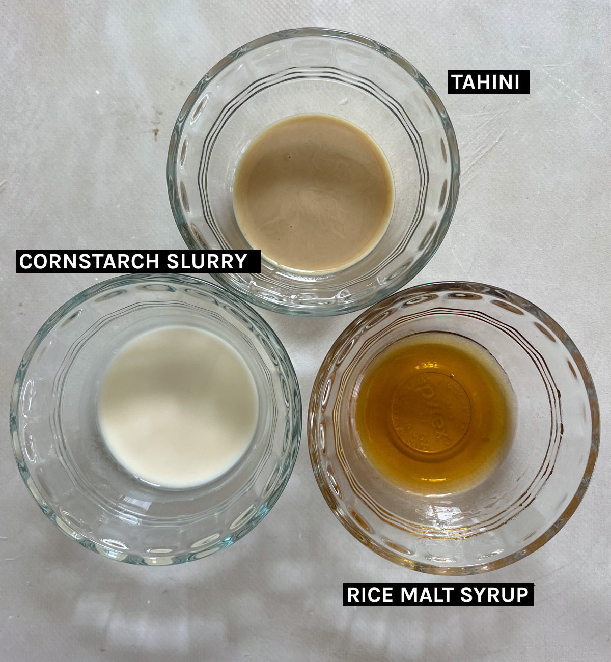 tahini, cornstarch slurry and rice malt in separate bowls