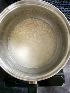 rice with water in a pot