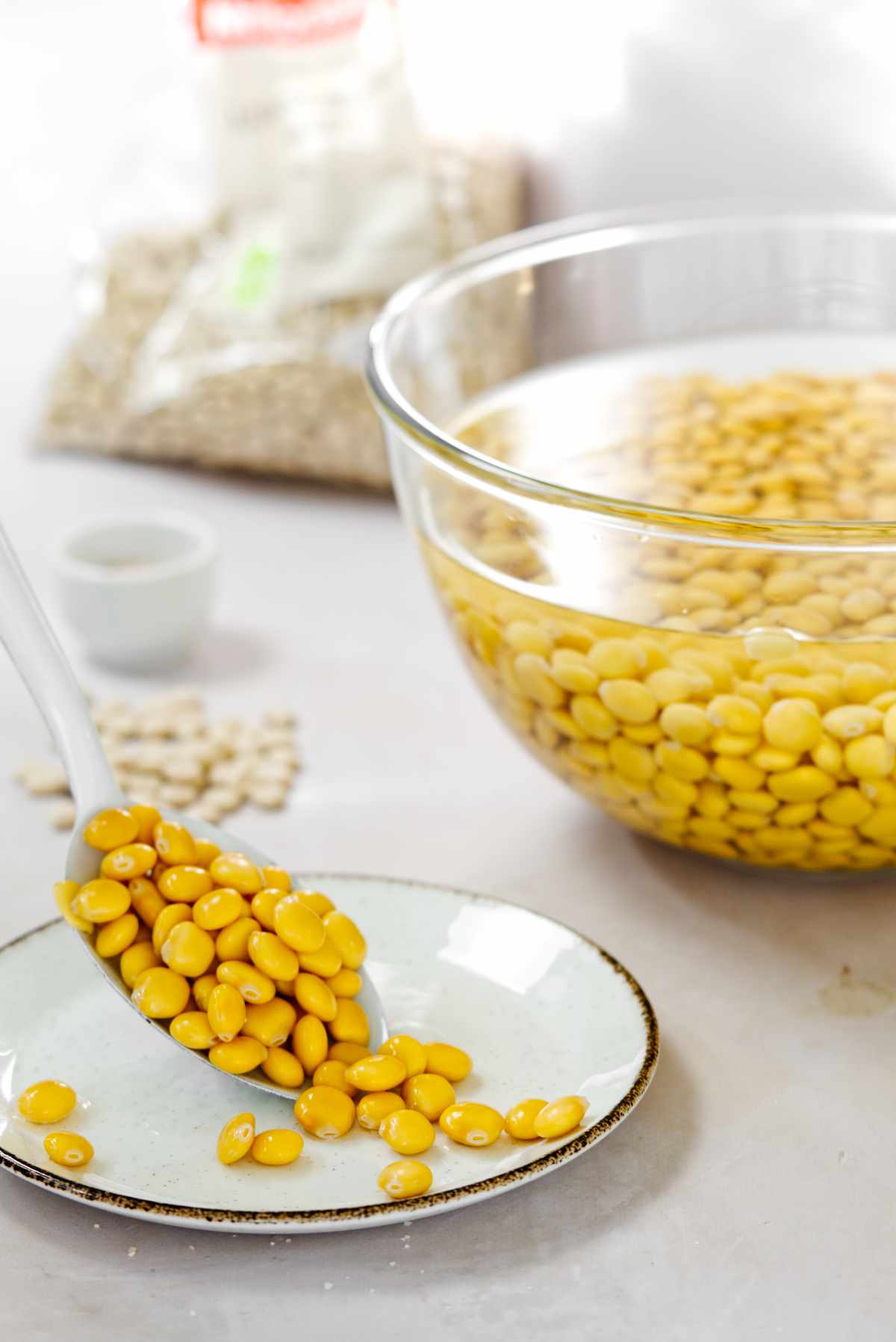 serving lupini beans with a white ladle