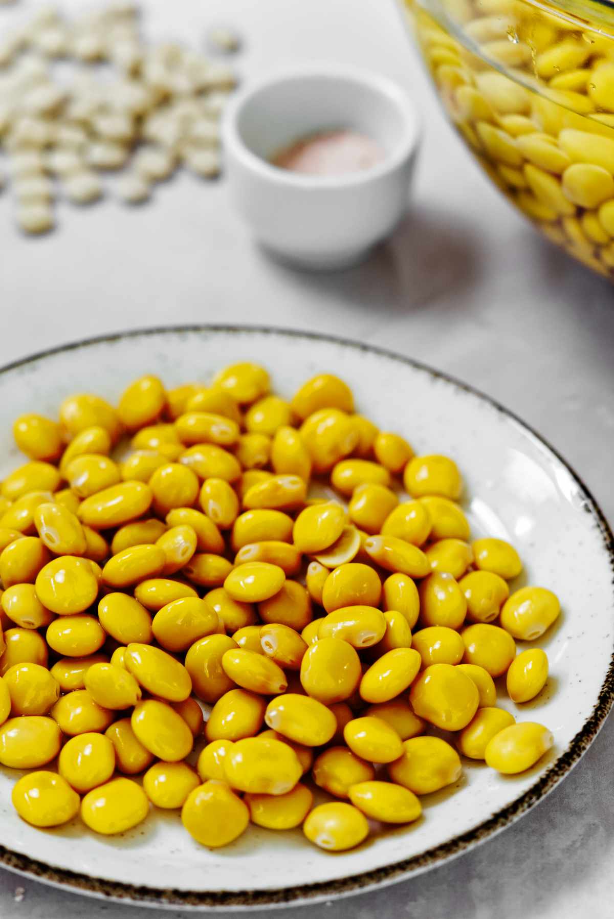 brined Lupini Beans in a white plate