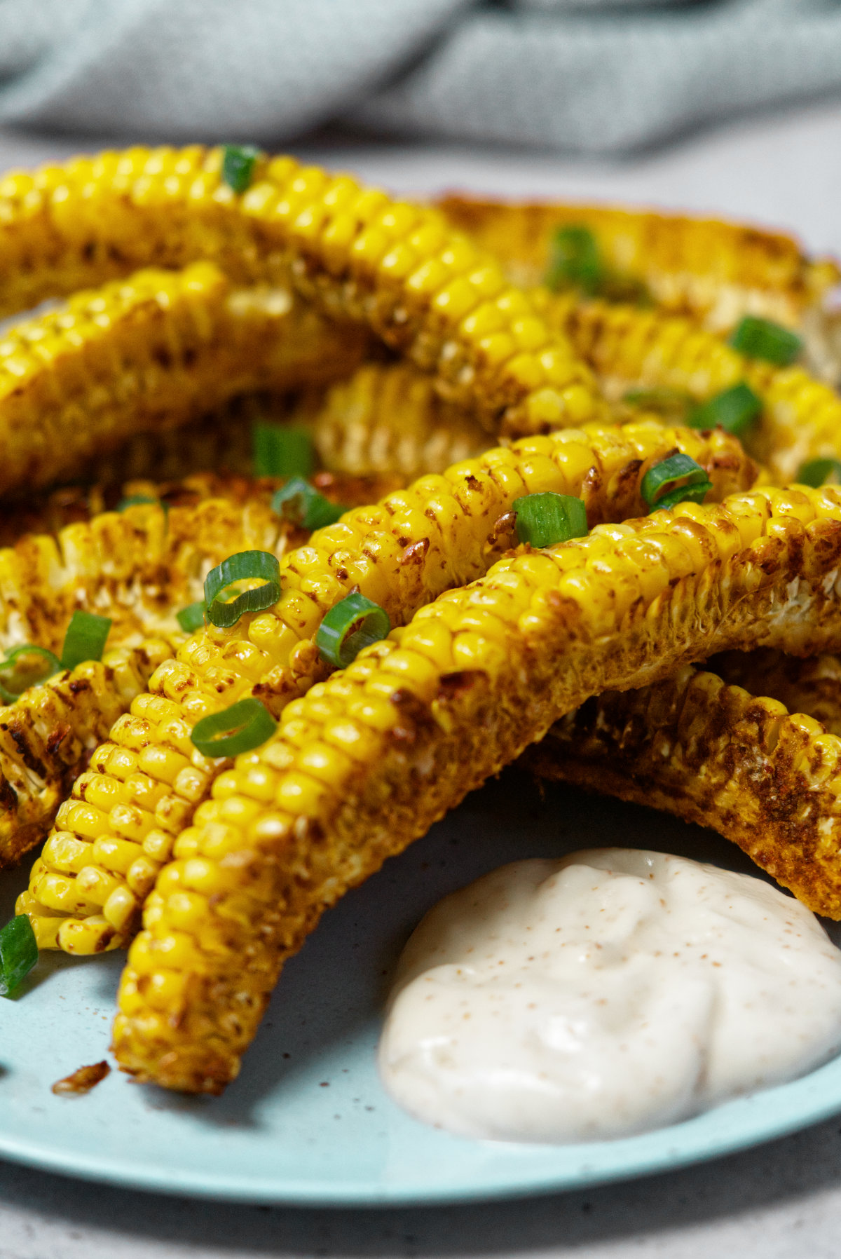 air fried corn ribs with a side of vegan mayonnaise