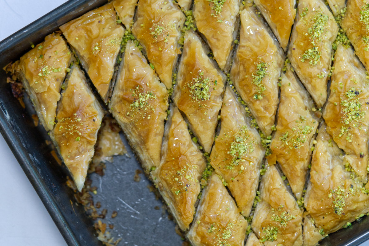 freshly cut baklawa in a tray