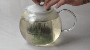 steeping and adding sweetener to herbal tea