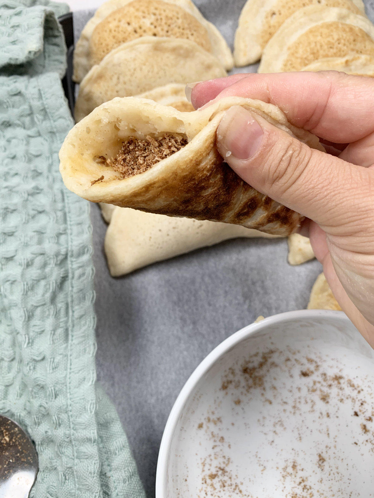 sealing the pancake with walnut filling