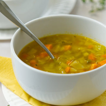 carrot and celery soup in a bowl