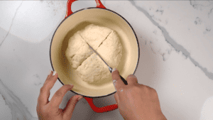 Scoring damper bread in a dutch oven