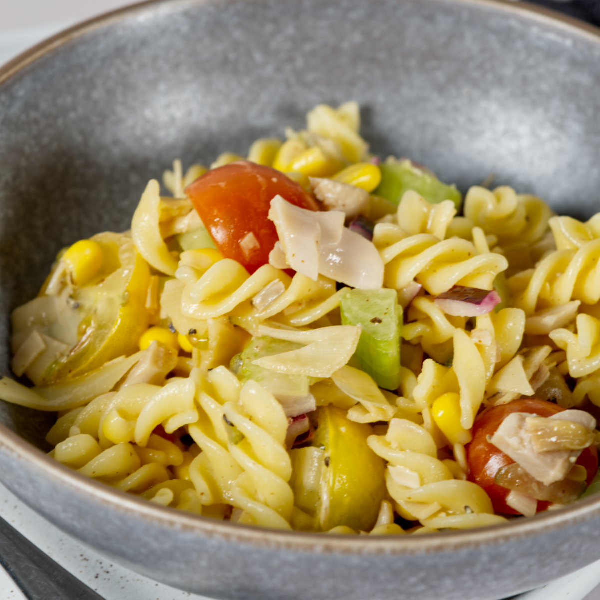 vegan pasta salad in a grey bowl