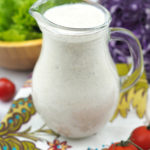 maple mustard dressing in a pitcher