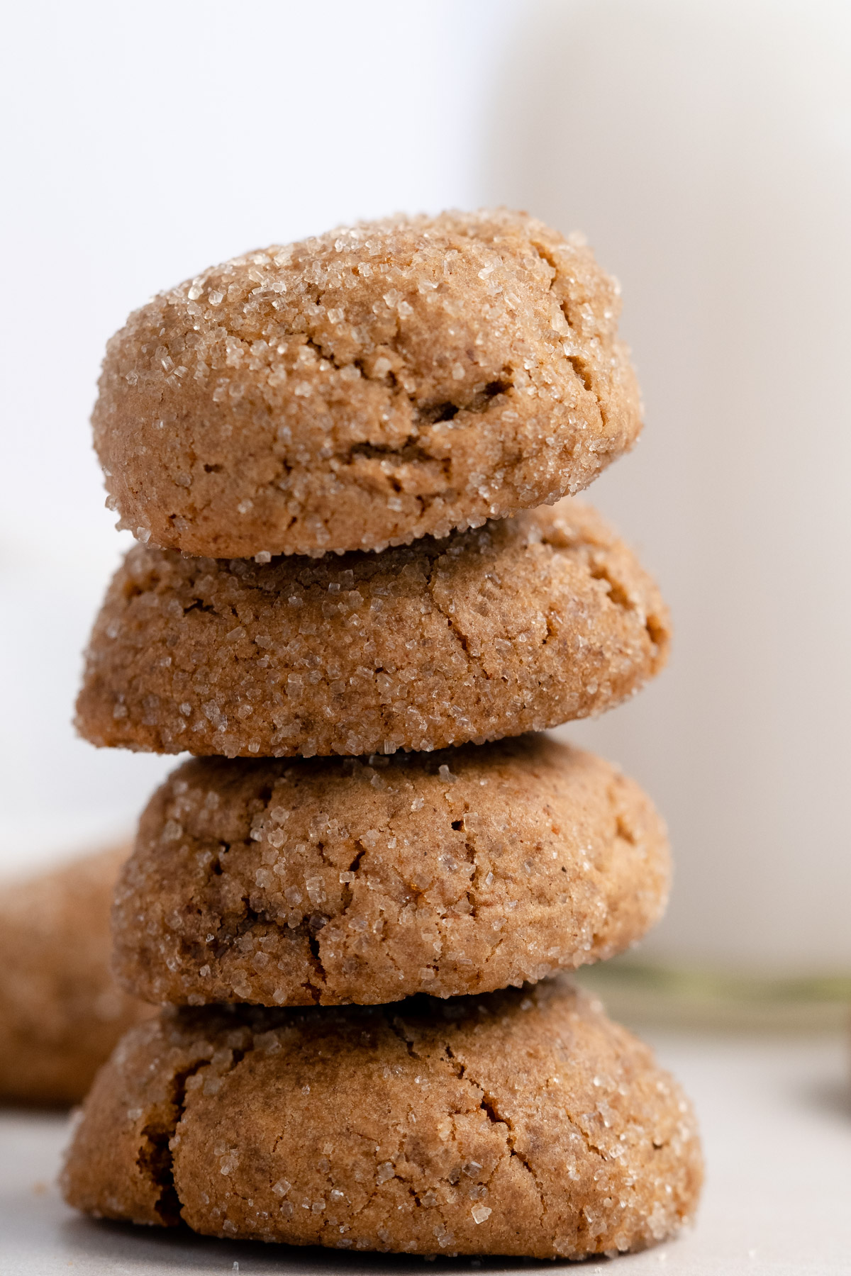 a close up of four ginger cookies stacked on top of each other