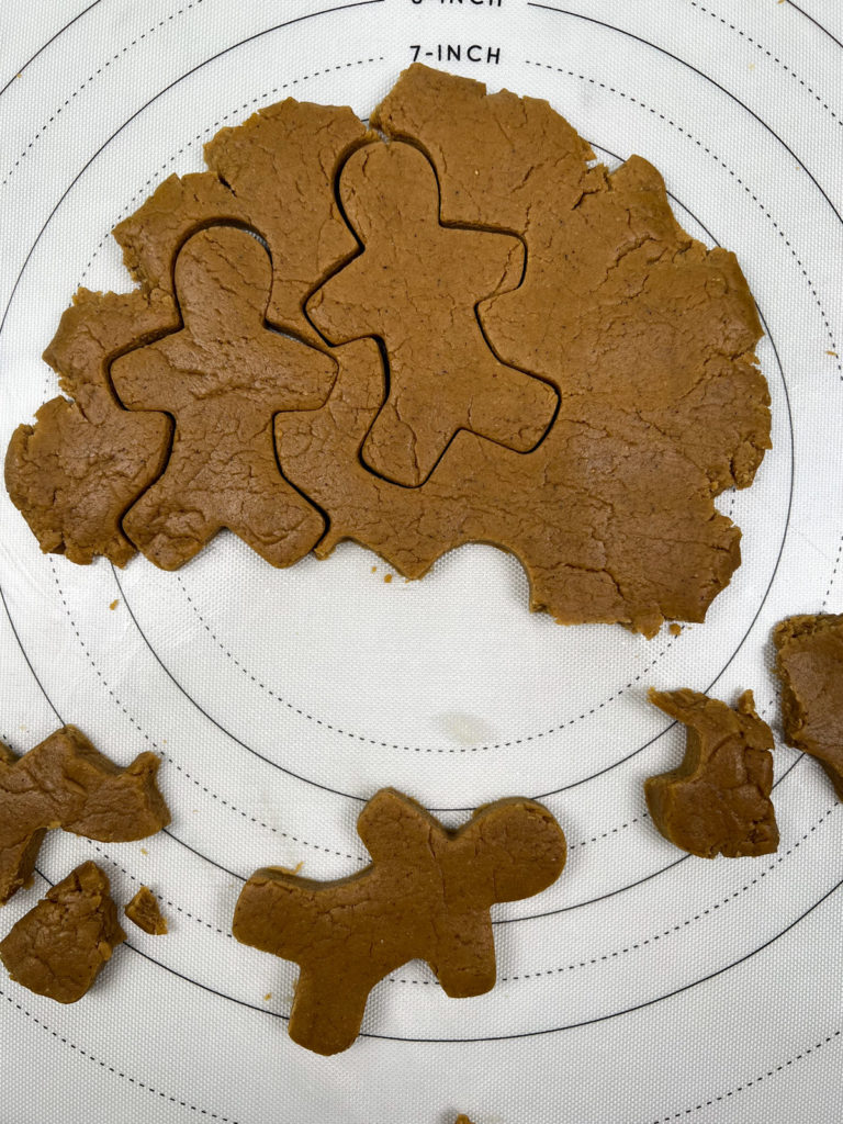 gingerbread men peeled away from the dough