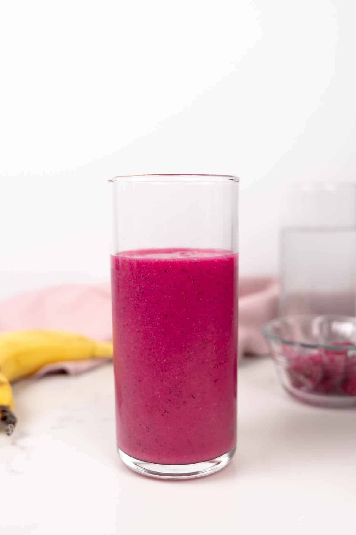 dragon fruit smoothie in a glass cup