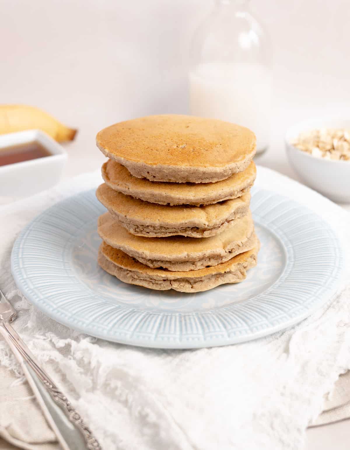 a blue plate of five gluten free pancakes