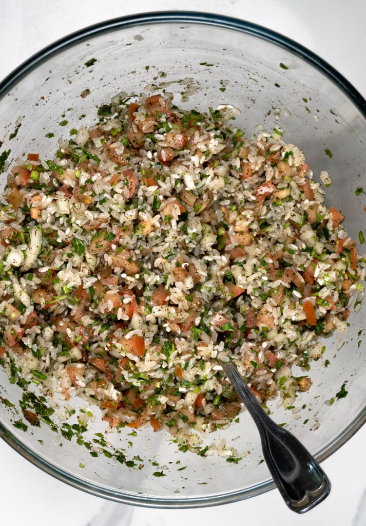 rice, vegetables and herb filling in a clear glass bowl