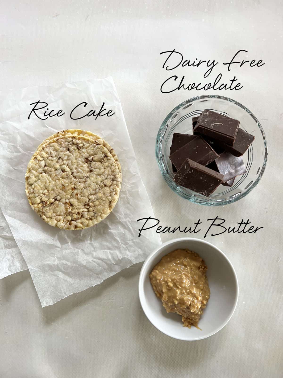 chocolate, rice cake and peanut butter in bowls