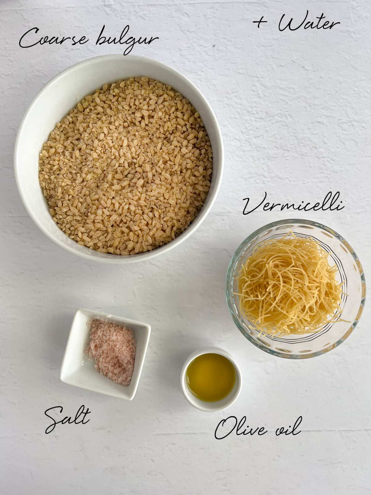 coarse bulgur, vermicelli, salt, olive oil in white bowls