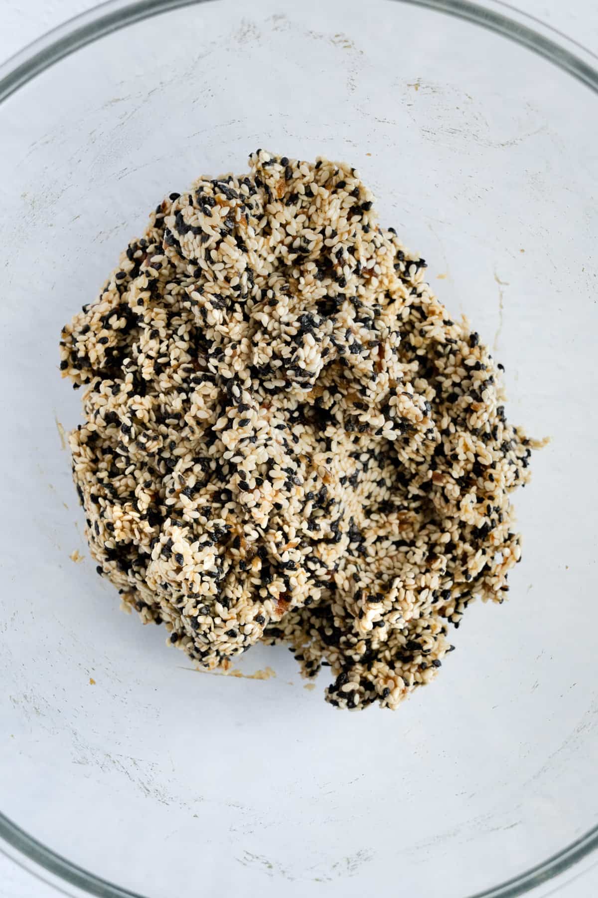 white and black sesame blended together in a glass bowl