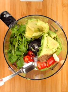 avocado, cilantro, chopped red chilli in a food processor bowl