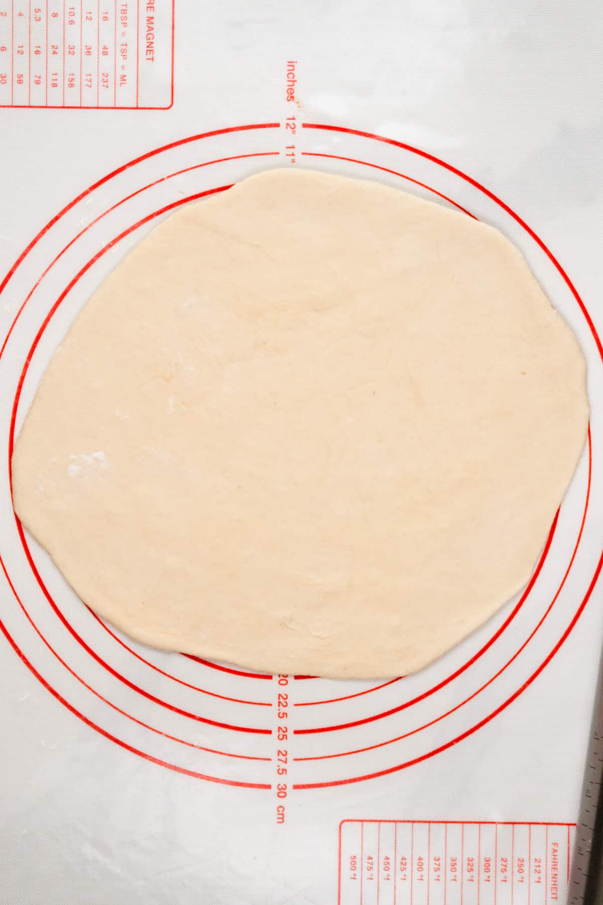 dough rolled out into a circle
