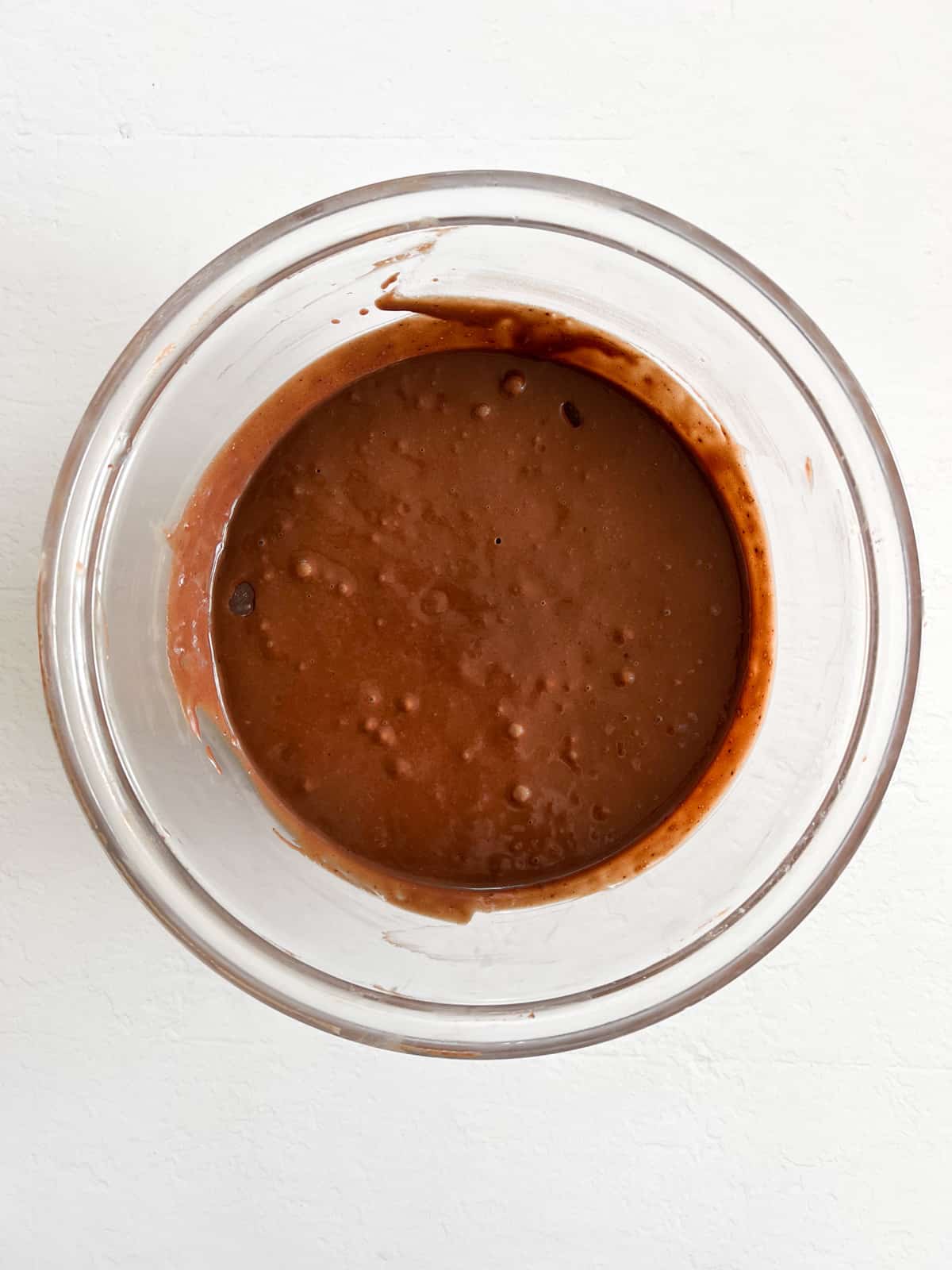 brown batter in a glass bowl