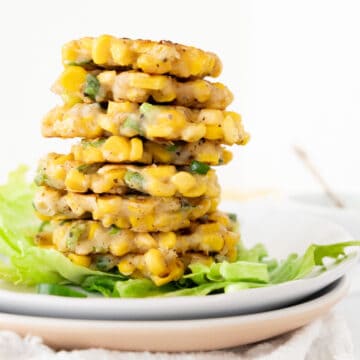 a stack of vegan corn fritters