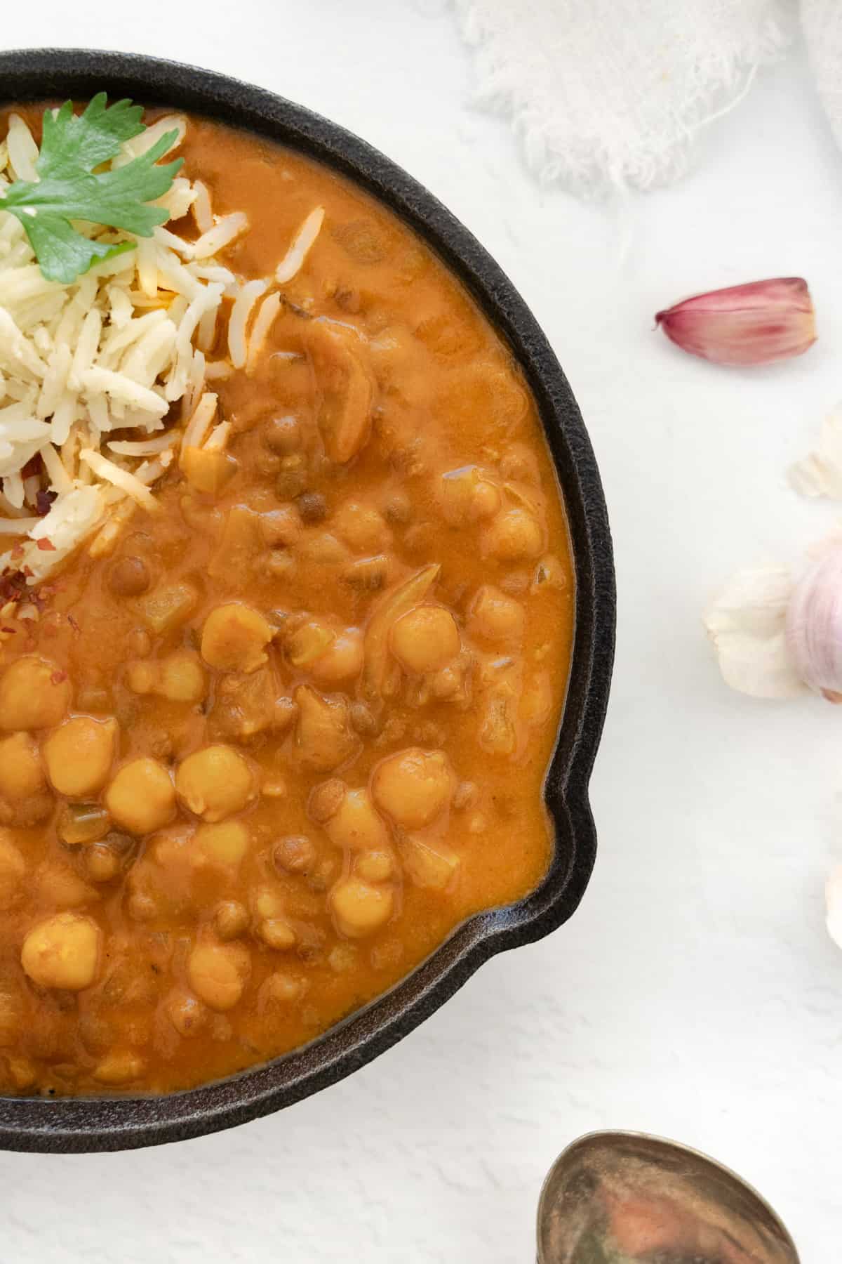 a back pan with lentil and chickpea curry