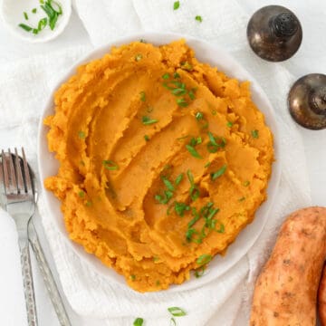 a plate of orange vegan sweet potato mash