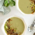 two bowls of vegan cream of celery soup