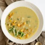 a bowl of creamy zucchini corn chowder