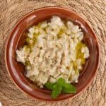 swiss chard tahini dip in a brown bowl