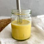 turmeric tahini dressing in a jar