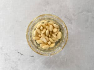 almonds soaking in water in a bowl