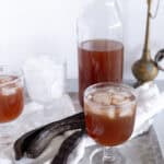 carob juice in a cup and vase