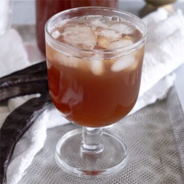 a glass of carob juice