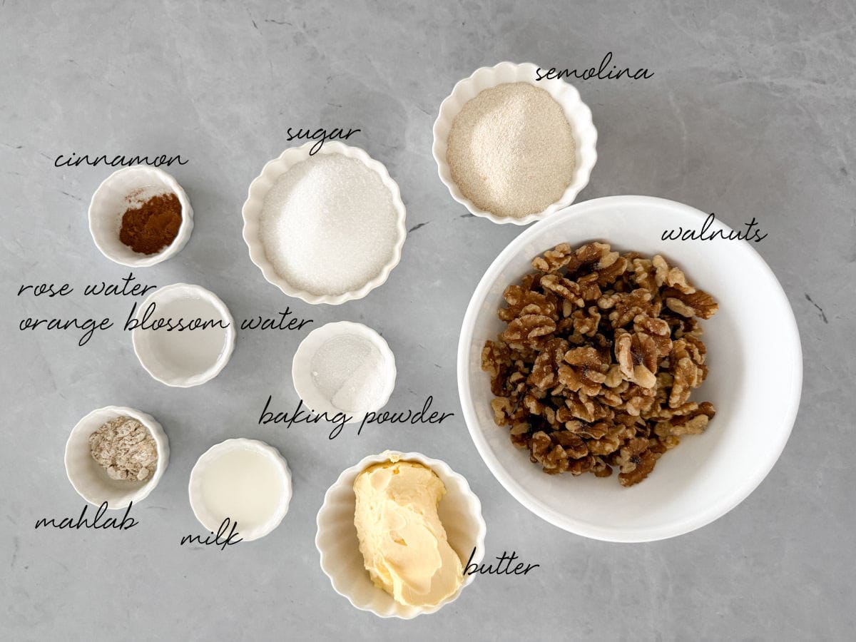 semolina, walnuts, sugar, butter, liquids and spices all laid out