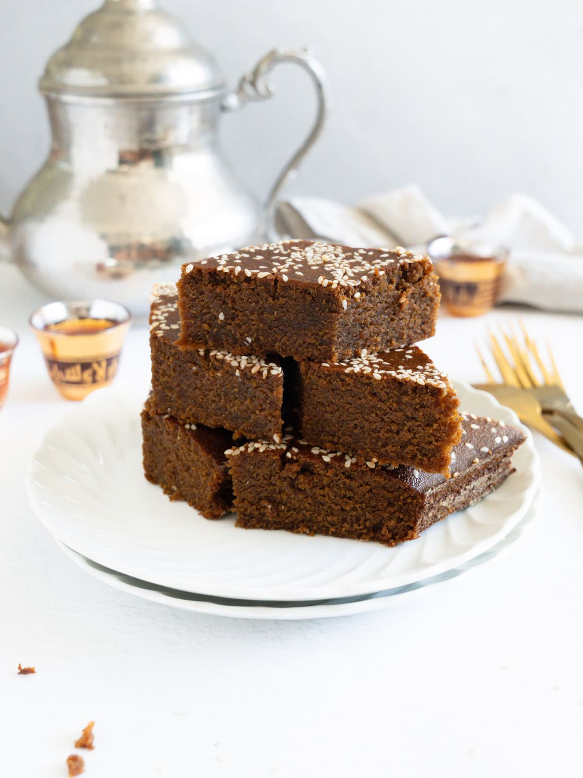 a stack of sfouf bi debes cake pieces