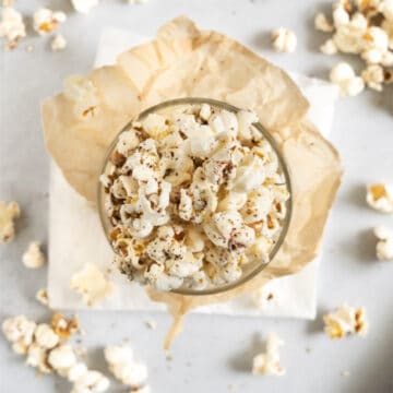 zaatar popcorn in a glass cup