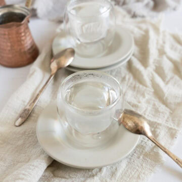 two cafe blancs in glass coffee cups