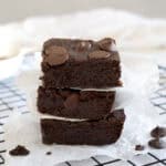 a stack of three chickpea brownies