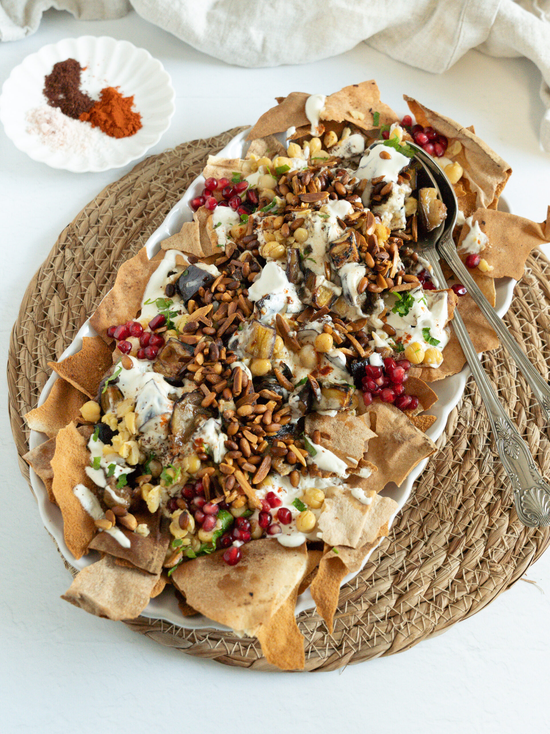 a plate of eggplant fatteh