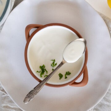 a bowl with yogurt tahini sauce