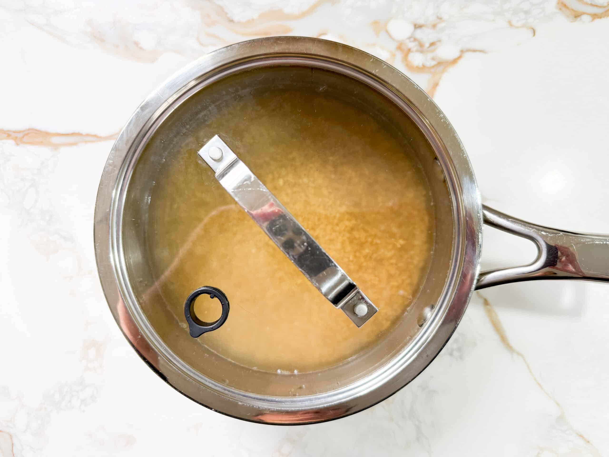 extra coarse bulgur in a pot of water