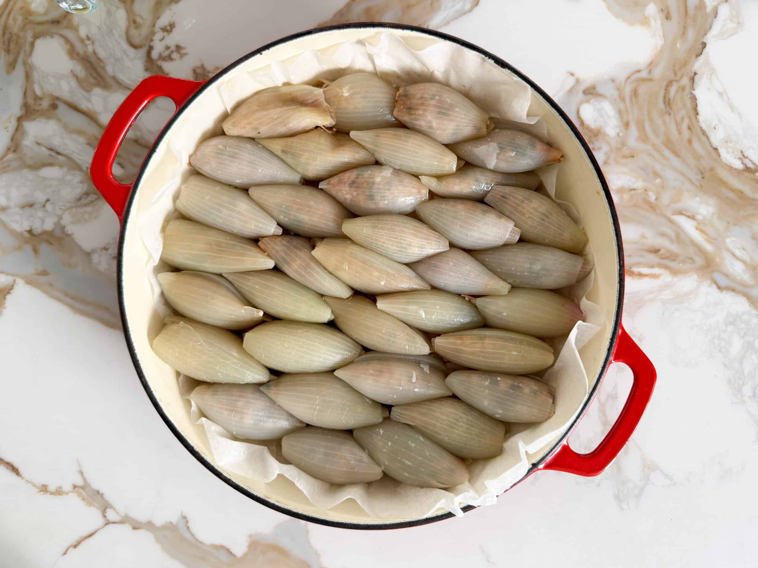 stuffed onion rolls in a casserole dish