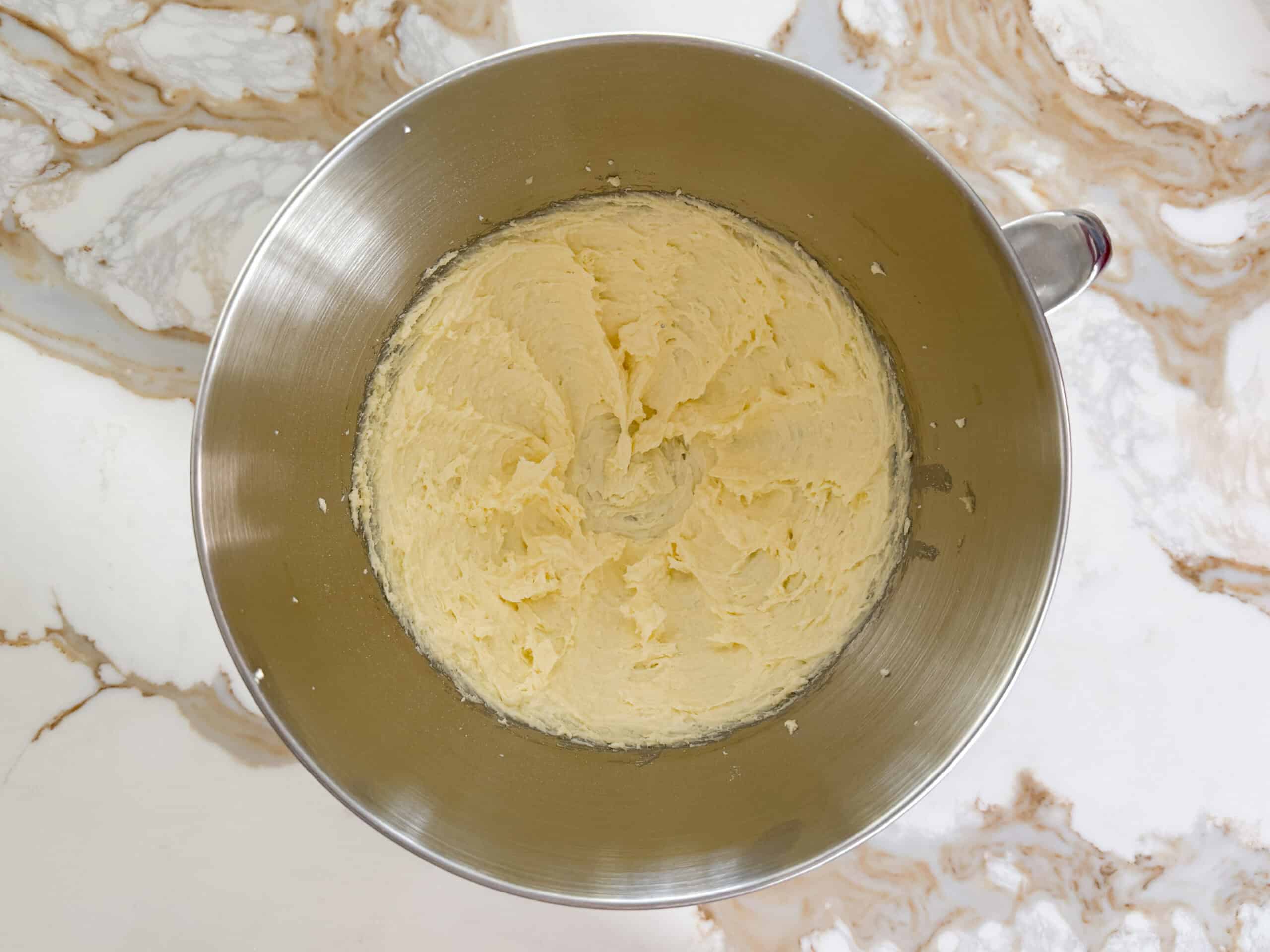 whipped ghee and powdered sugar in a bowl