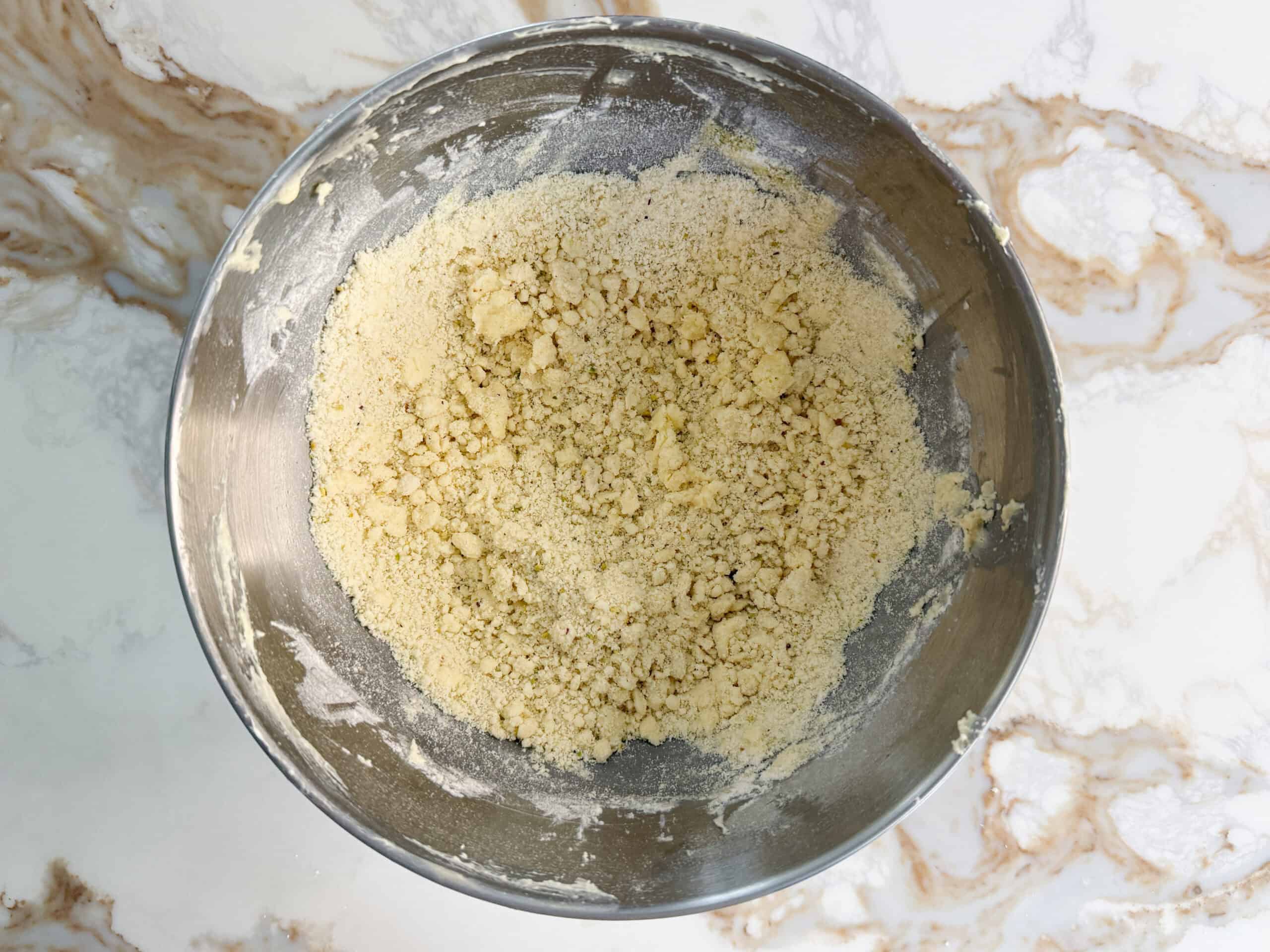 crumbly ghraybeh dough in a bowl